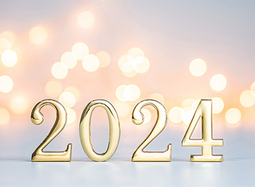 Dígitos dourados em número de 2024 com luzes bokeh no fundo. Cenário de ano novo de 2024. Leve e suave
